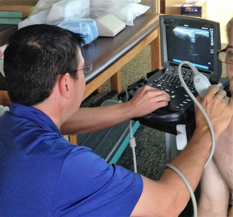 dr bolin of performance medicine performs an ultrasound in roanoke virginia